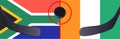 Top view hockey puck with South Africa vs. Cote d`Ivoire command with the sticks on the flag. Concept hockey competitions