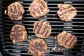 Top view of home made burgers on an outdoor gas BBQ Royalty Free Stock Photo