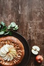 top view of homemade apple pie and fresh apples with green leaves Royalty Free Stock Photo