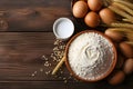 Top View homemade Baking Ingredients,Milk, Butter, Eggs, and Flour on Wooden Table