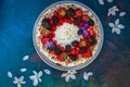 Top view on homemade birthday cake decorated with berries.