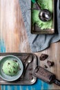 Top view of homemade mint or pistachio icecream in a bowl with c
