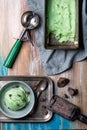 Top view of homemade mint or pistachio icecream in a bowl with c