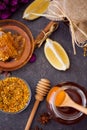 Top view of honeycomb, pollen, propolis, honey on the table