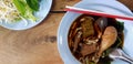 Top view of hot chicken noodle with boiled bitter gourd Royalty Free Stock Photo