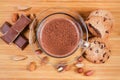 Top view of hot chocolate among the nuts and confections Royalty Free Stock Photo