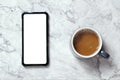 Top view Hot coffee and blank screen smartphone Royalty Free Stock Photo