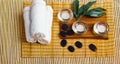 Top view of hot stones setting for massage treatment on blackboard with copy space.Towel, Salt, Plumeria Flower, Bowl for spa ther Royalty Free Stock Photo