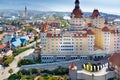 Top view of the hotel Bogatyr, amusement park Sochi Park, mountains and the sea. Adler, Russia - March 26, 2020