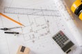 Top view of house plan blueprint paper with repair tools on table desk at architecture office Royalty Free Stock Photo
