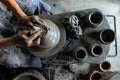 Top view of human hands working on pottery wheel Royalty Free Stock Photo