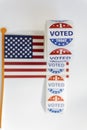 Top view of I Voted Today stickers and american flag on white background. US elections concept Royalty Free Stock Photo