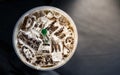 Ice coffee in a plasstic glass with straw