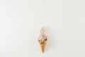 Top view ice cream cone branch flowers white background Minimal spring Flat lay