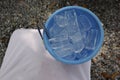 top view of ice cubes put in a plastic bucket concept Royalty Free Stock Photo