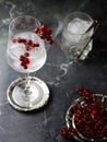 Top view of iced red currant drink in wine glass. Fresh ice cold fruit cocktail in glass, refreshing summer red currant berry Royalty Free Stock Photo