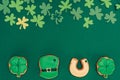 top view of icing cookies and paper shamrock