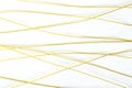 Top view if colored golden wire on the white background Royalty Free Stock Photo