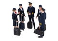 Top view of an aircrew with travel bags standing and talking