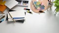 Top view image of artist/painter working table with accessories putting on it.