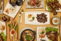 top view image of asian food dishes, tagalog, spring rolls, roast beef