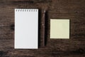 Top view image of blank notebook ,empty sticky note paper and pe Royalty Free Stock Photo