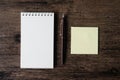 Top view image of blank notebook ,empty sticky note paper and pe