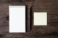 Top view image of blank notebook ,empty sticky note paper and pe Royalty Free Stock Photo