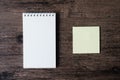 Top view image of blank notebook and empty sticky note paper on Royalty Free Stock Photo