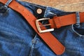 Brown Leather Belt and Blue Jeans Close Up Royalty Free Stock Photo