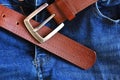 Brown Leather Belt and Blue Jeans Close Up Royalty Free Stock Photo