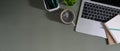 The top view image of a computer laptop is putting on a working desk.