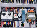 Top view image of electrical circuit and components in hoist control panel.