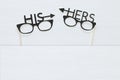 Top view image of funny and colorful photo booth props with text: HIS, HERS for party or wedding over white background. Royalty Free Stock Photo