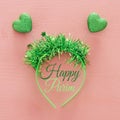 Top view image of funny party head glitter accessory with hearts. Flat lay. Purim celebration concept