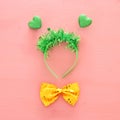 Top view image of funny party head glitter accessory with hearts. Flat lay. Purim celebration concept