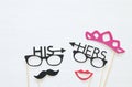 Top view image of funny photo booth props with text: HIS, HERS for party or wedding over white background. Royalty Free Stock Photo