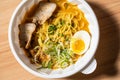 Top view image of Japanese traditional dish, Maze-soba ramen with raw egg yolk. garlic, minced meat. Taiwan abura soba on a