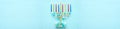 Top view image of jewish holiday Hanukkah background with traditional spinnig top, menorah (traditional candelabra) and candles. Royalty Free Stock Photo