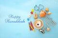 Top view image of jewish holiday Hanukkah background with traditional spinnig top, menorah & x28;traditional candelabra& x29; Royalty Free Stock Photo