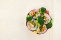 Top view image of Korean sushi rolls, Kibmab on a lunch box with broccoli
