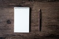 Top view image of open notebook with blank page and pen on the w Royalty Free Stock Photo