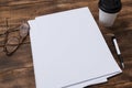 top view image of open notebook with blank pages next to cup of coffee on wooden table. ready for adding text Royalty Free Stock Photo