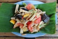 Top view image Papaya salad with fresh vegetables, popular food concept in Thailand