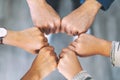 People putting their fisted hands in circle together Royalty Free Stock Photo