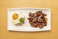 Top view image of Philippine popular dish of tocilog with fried egg, poppy seeds on the yolk, bowl of white rice Royalty Free Stock Photo