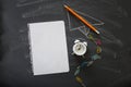 Top view image of plane sketch next to empty notebook paper and Royalty Free Stock Photo