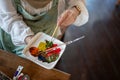 Top view image of a professional and talented female artist mixing colors on a palette Royalty Free Stock Photo