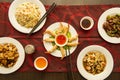 Top view image of set of popular Chinese food dishes, gabardine prawns, spicy prawns, beef with peppers