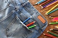 Denim Jeans and Colored Pencils Royalty Free Stock Photo